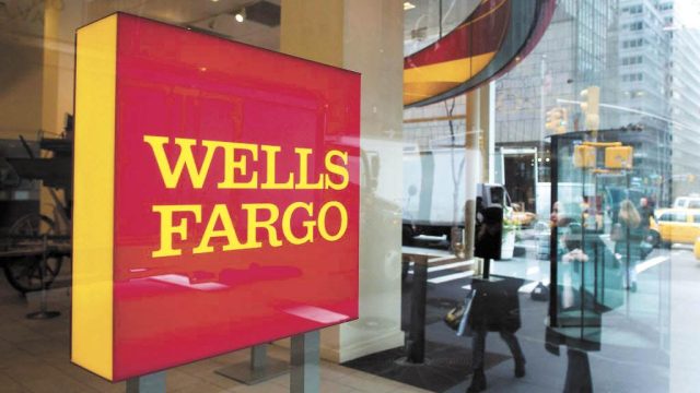 Wells Fargo Lowers Profit As Debt Piles Up