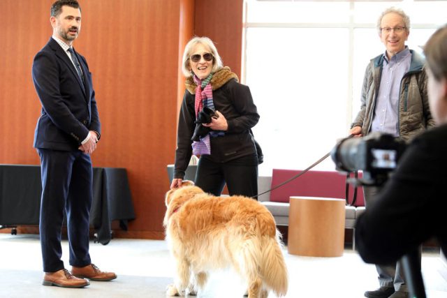 Renowned economist Claudia Goldin enjoying a moment with her loyal companion, a cherished dog by her side.
