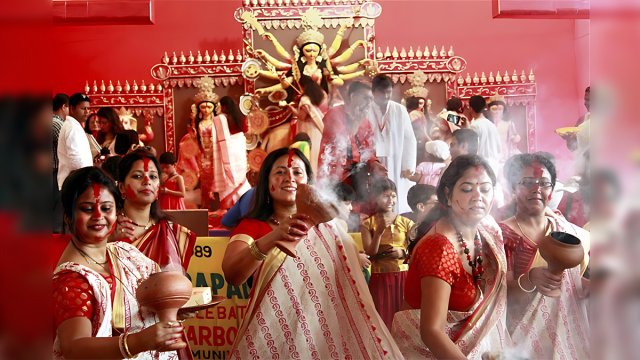 Celebrating Puja in Vibrant Colors: A Divine Affair