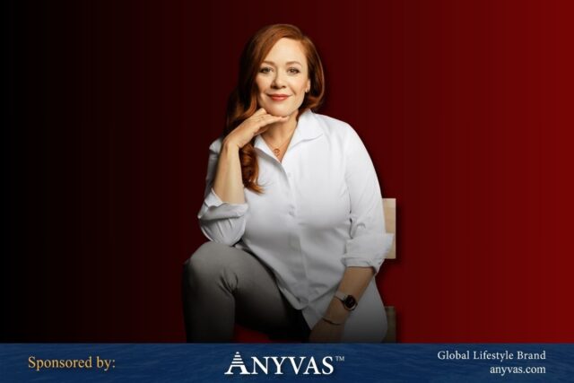 Bree McKeen, founder of Evelyn & Bobbie, sitting with a confident smile, wearing a white shirt against a gradient red background. Sponsored by Anyvas, a global lifestyle brand.