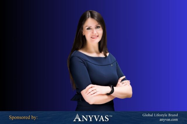 Nora Khaldi stands confidently in her laboratory, sponsored by ANYVAS.