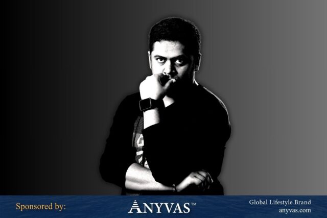 Mirza Rakib Shovon confidently standing with a deep, insightful gaze in a black-and-white portrait, sponsored by Anyvas.